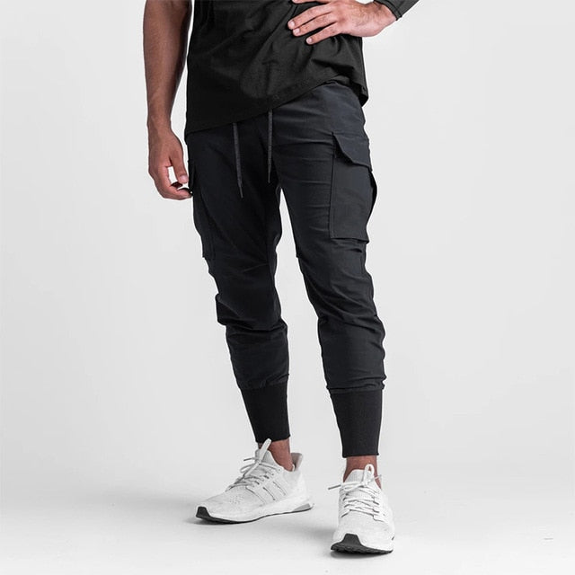 Jogger-Men-s-Sport-Pants-Street-Wear-Elastic-Fashion-Casual-Men-Sweatpants-with-Pockets-Gym-Running.jpg_640x640_d60ee076-0e3a-406b-9ff4-5ea2d734e024.jpg